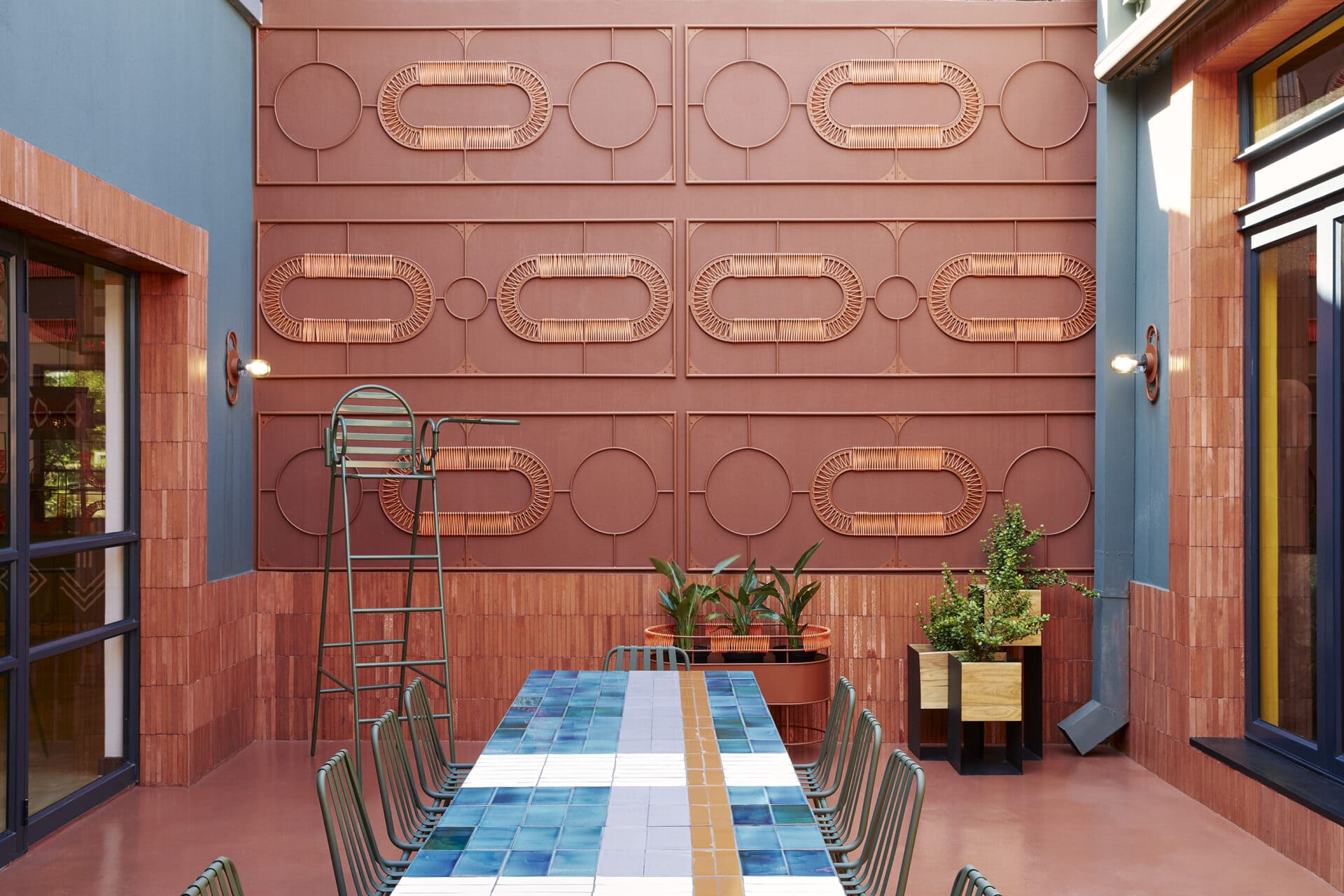 Wall-mounted steel, woven screen by TheUrbanative at Nando’s Central Kitchen. 
Photograph by Elsa Young.
