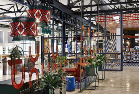 Steel and woven screens by TheUrbanative at Nando’s Central Kitchen (headoffice, Johannesburg) and beaded lights by Mash. T Design Studio. Photograph by Elsa Young.